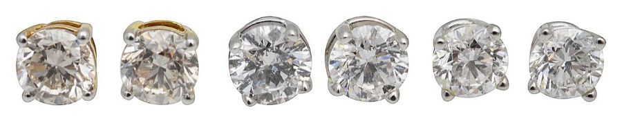 Three pairs of diamond ear-studs
