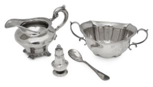 An early Victorian silver cream jug and other silver