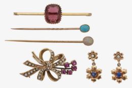 A 9ct ruby and diamond brooch, stone brooch, two pins and ear drops