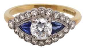 A diamond and sapphire-set ring