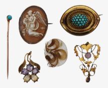 A turquoise mourning brooch, cameo brooch and three others