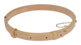 A Victorian stiff bangle in the form of a belt