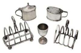 Silver to include two four division toast racks and two mustard pots
