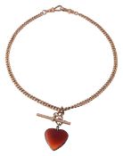 A 9ct Albert chain with cornelian heart