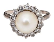 A cultured pearl and diamond-set cluster ring