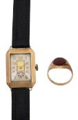 A 9ct gold gentleman's signet ring with a 9ct gold watch head