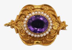 A mid Victorian amethyst and seed pearl brooch/pendant