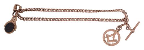 A 9ct rose gold guards chain with a stone set swivel fob and medallion