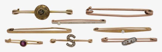 A collection of 9ct gold bar brooches and bib pins