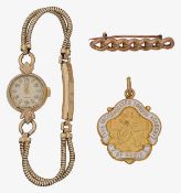 A gold and white medal, a ladies gold dress watch & 9ct brooch