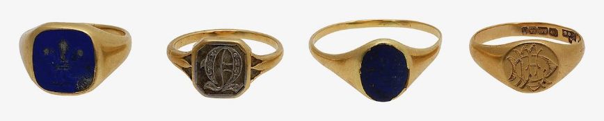 Three 18ct gold signet rings and another