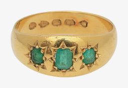 A Victorian 1882-1883 22ct emerald three stone ring