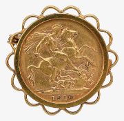 An Edward VII 1910 full sovereign coin in a 9ct brooch mount