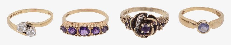Four gem set rings including an amethyst five stone ring