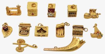 An interesting collection of 9ct charms