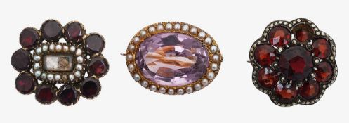 A late Georgian garnet and seed pearl locket brooch