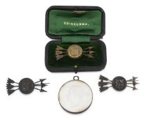 A 19th century silver Grand National Archery Meeting medal by Wyon and prize brooches