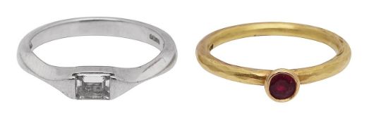 A platinum diamond ring and an 18ct ruby set ring