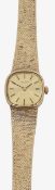 A 9ct gold lady's Tissot bracelet wristwatch