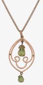 A 9ct gold Edwardian peridot pendant on 9ct gold chain