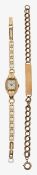 A 9ct gold identity bracelet and 9ct watch head