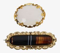 A Victorian white oval agate brooch with a banded agate brooch