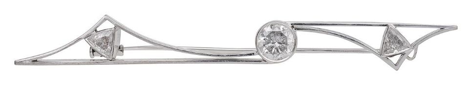 A three stone diamond brooch