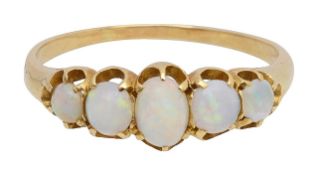 An opal five stone graduating ring