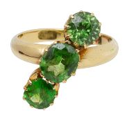 A 18ct green garnet three stone ring