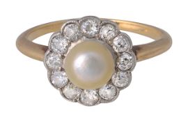 A pearl and diamond-set cluster ring