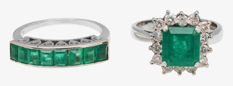 An emerald and diamond-set cluster ring and another