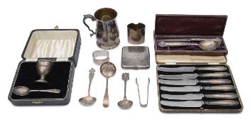 A collection of silver to include a George V half pint mug