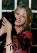 Brigitte Bardot signed 10x8inch colour photo. Dedicated. Good condition Est.