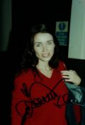 Dannii Minogue signed 6x4inch colour photo. Good condition Est.