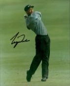 Tiger Woods signed 10x8 inch colour photo. Good condition Est.