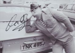 Alexei Sayle signed 7x5inch colour photo. Good condition. All autographs come with a Certificate