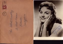 Janet Blair signed 8x6 inch vintage black and white photo with original 1958 mailing envelope.
