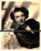 Paula Raymond signed 10x8 inch black and white vintage photo dedicated with original MGM 1952