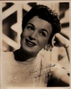 Lydia Clarke Heston signed 10x8 inch black and white vintage photo with original mailing envelope.