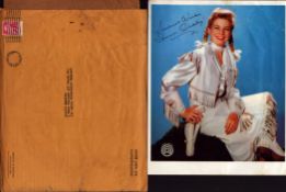 Gail Davis signed colour 10x8inch photo. Signed as Annie Oakley. Comes with original mailing