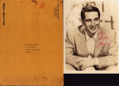 Perry Como signed 10x8 inch vintage sepia photo includes original New York mailing envelope. Good