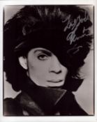Prince signed 10x8 inch black and white photo. Good condition. All autographs come with a
