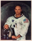 Michael Collins signed 10x8 inch NASA photo pictured in Space suit. Good condition. All autographs
