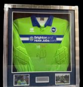 Tomasz Kuszczak Match Worn Shirt Brighton and Hove Albian FC. Mounted and framed. Measures 30x34
