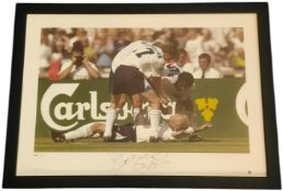 Paul Gascoigne signed 25x18 inch framed photo celebrating his goal against Scotland during Euro