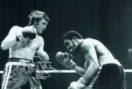 Boxing John H Stracey signed 12x8 inch black and white photo. Good condition Est.