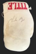 Charlie Magri signed white signed Title boxing glove. Carmel Magri (born 20 July 1956), who boxed