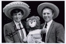 Marin Peters signed 12x8 inch black and white photo pictured with Bobby Moore.. Good condition Est.