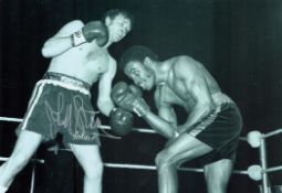Boxing John H Stracey signed 12x8 inch black and white photo. Good condition Est.