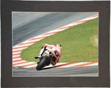 Marco Simoncelli 16x12 inch mounted colour photo. Unsigned. Good condition Est.